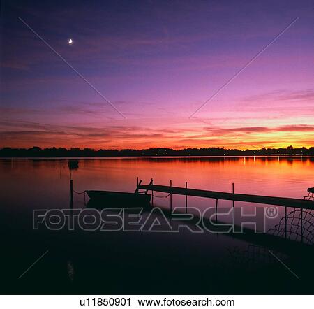 Stock Image - bright, set, michigan, lake, walled, sun. Fotosearch