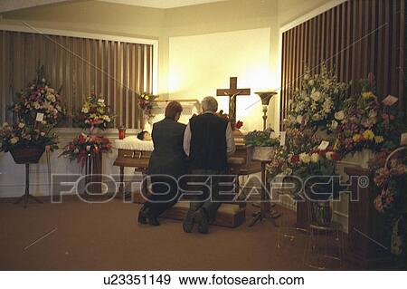 Stock Photo - brooklyn, kneeling, wake, coffin, open, couple. Fotosearch