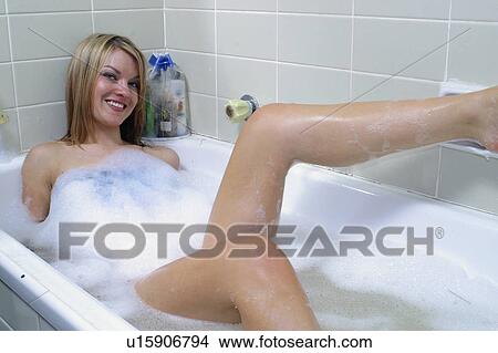 Picture - bubble, blonde, relaxing, female, woman, young. Fotosearch
