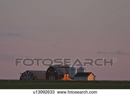 buildings, sun, farm, up, lighting, setting View Large Photo Image Stock Image - buildings, sun, farm, up, lighting, setting. Fotosearch