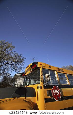 Stock Image - bus, valley, crane, parked, school. Fotosearch