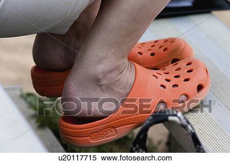 Stock Photography - clogs, crocs, usa, minnesota, paul, orange. Fotosearch