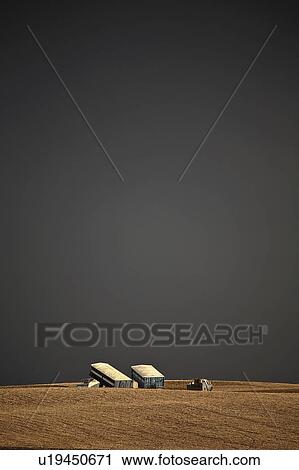 Stock Image - clouds, trucks, grain, storm. Fotosearch