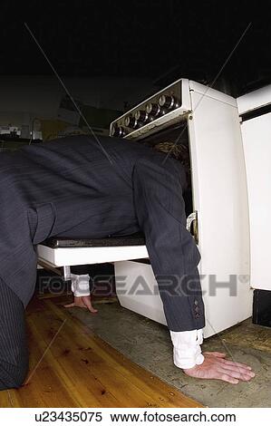 Stock Photography - committing, head, sticking, suicide, male. Fotosearch