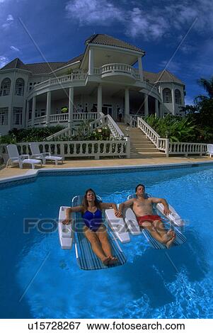 Stock Photo - couple, female, woman, male, young. Fotosearch