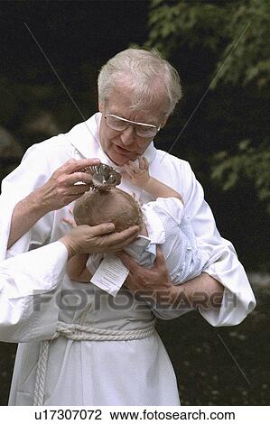 Stock Image - creekside, infant, minnehaha, priest, episcopal, baptism. Fotosearch
