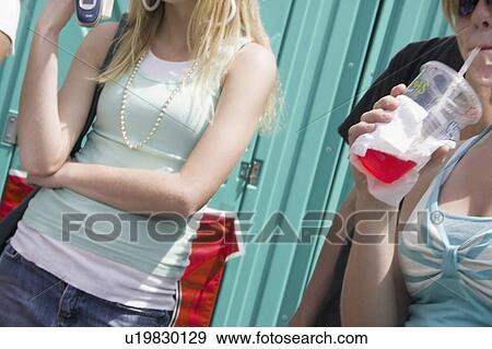 Stock Photo - day, drinking, old, grand, slurpees, girls. Fotosearch