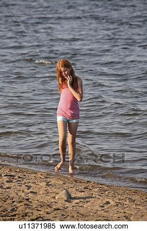 Stock Photography - diefenbaker, girl, lake, beach, enjoying, young. Fotosearch