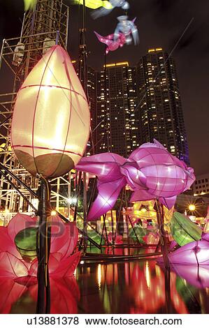 Stock Photo - displayed, fish, pond, lanterns, flower, illuminated. Fotosearch