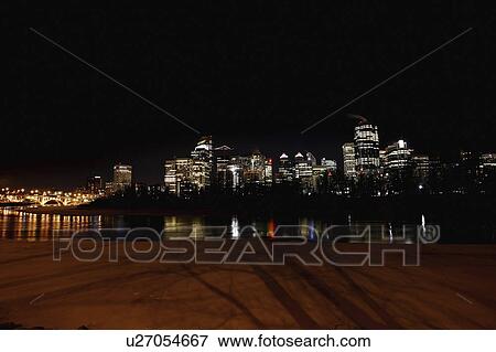 Stock Photo - downtown, buildings, water, off, reflected, lit. Fotosearch