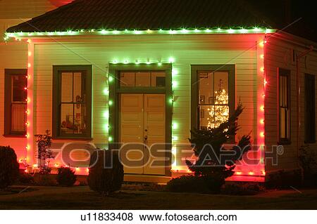 Stock Photo - dusk, light, sound, mukilteo, holiday, tree. Fotosearch
