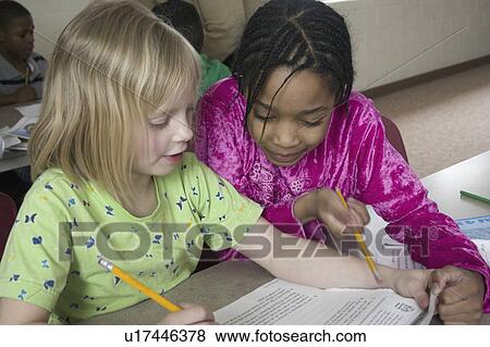 Stock Photo - express, working, youth, school, homework, students. Fotosearch