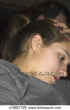 Stock Photo - family, 14, age, party, pensive. Fotosearch