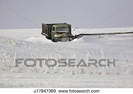 Stock Photo - farm, drift, snow, truck, abandoned. Fotosearch
