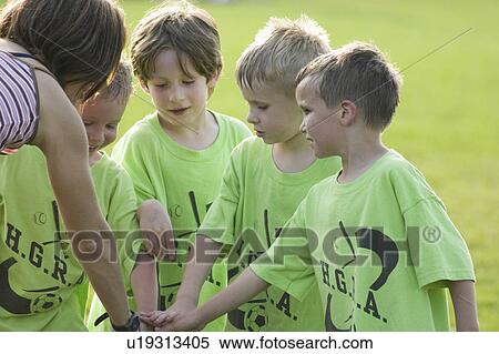 Stock Photography - field, engaging, carondelet, spirit, team, coach. Fotosearch