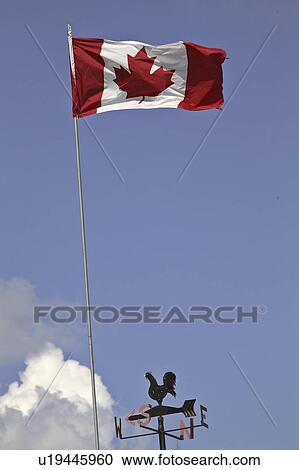 Stock Image - flag, scenic, weathervane, waving, canadian. Fotosearch