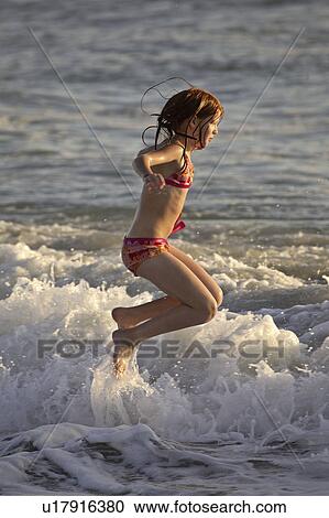 florida, girl, beach, surf, enjoying, young View Large Photo Image Stock Image - florida, girl, beach, surf, enjoying, young. Fotosearch