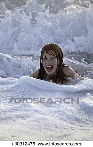 florida, girl, beach, surf, enjoying, young View Large Photo Image Stock Photography - florida, girl, beach, surf, enjoying, young. Fotosearch