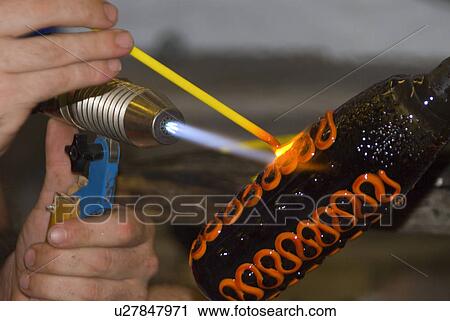 Stock Image - gallery, artist, art, fire, torch, glass. Fotosearch