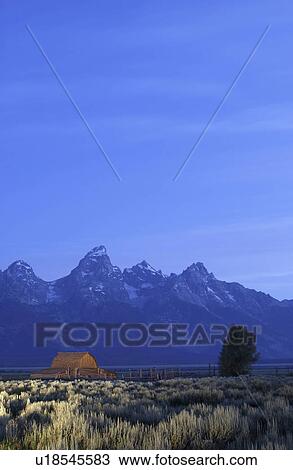 Stock Image - grand, barn, below, brush, sage, old. Fotosearch