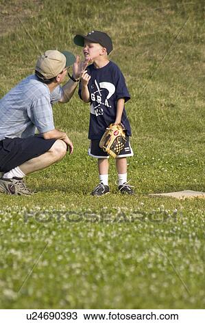Stock Image - helping, age, injury, field, coach. Fotosearch