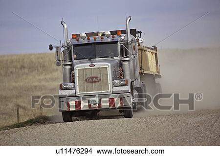 Picture - highway, truck, dust, up, throwing, grain. Fotosearch