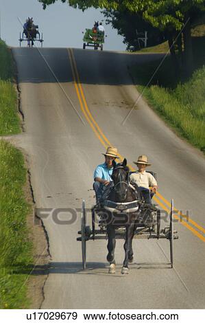 Stock Photo - horse, rt, highway, buggy, 600, traffic. Fotosearch
