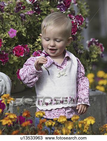 Stock Image - jaw, boy, moose, posing, flowers, young. Fotosearch