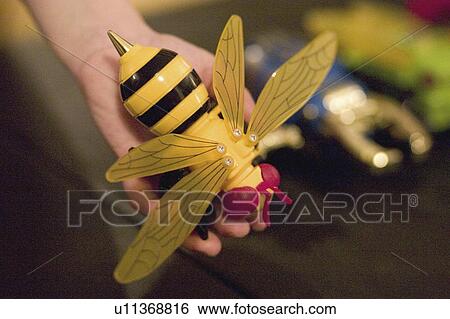 Stock Photograph - kids, part, children, toy, transformer, insect. Fotosearch