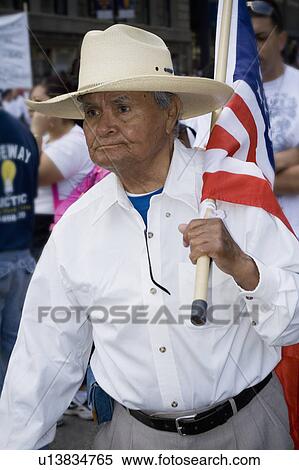 Stock Photography - male, march, immigration, protesting, latino. Fotosearch