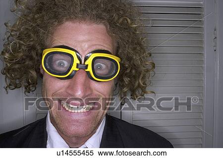 Stock Photography - male, smiling, freak, goggles, freaky. Fotosearch