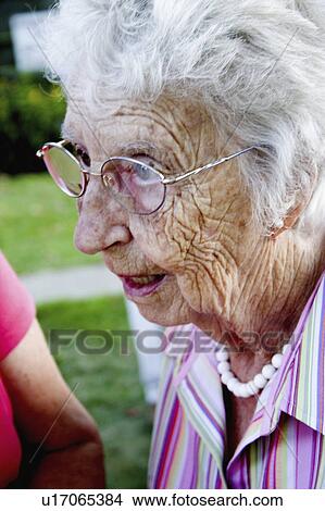 Picture - mckinley, woman, funeral, attending, female, older. Fotosearch