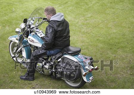 Stock Photo - motorcycle, harley, softail, heritage, davidson, aqua. Fotosearch