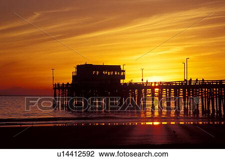 Stock Image - newport, beach, travel, sunset, wave, orange. Fotosearch