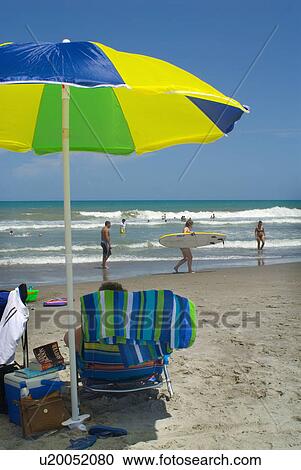 ocean, beach, surf, sand, read, book View Large Photo Image Stock Image - ocean, beach, surf, sand, read, book. Fotosearch
