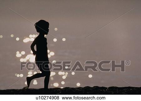 ocean, child, shimmering, silhouetted, kid, young View Large Photo Image Stock Photo - ocean, child, shimmering, silhouetted, kid, young. Fotosearch