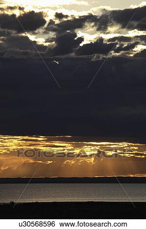 old, sun, behind, clouds, lighting, setting View Large Photo Image Stock Photograph - old, sun, behind, clouds, lighting, setting. Fotosearch
