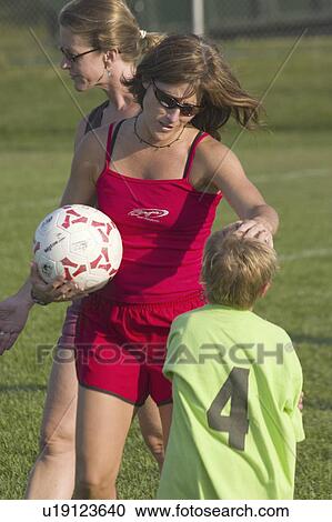 Stock Image - one, soccer, needs, attending, coach, cute. Fotosearch