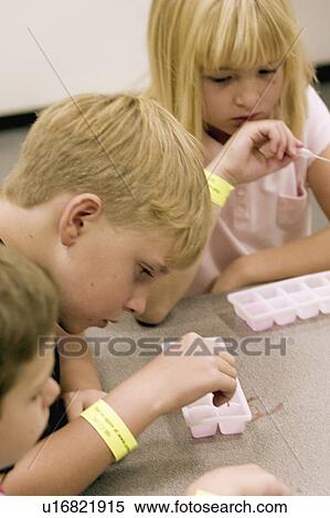 Stock Photography - paul, experimenting, museum, science, paints, kids. Fotosearch
