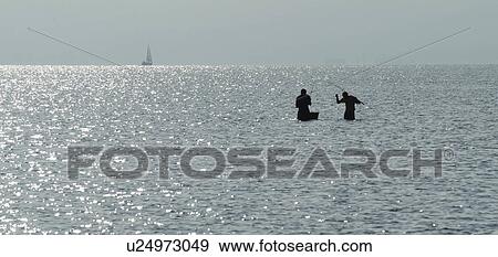 Stock Photo - platja, beach, tarragona, catalunya, spanya, fishermen. Fotosearch