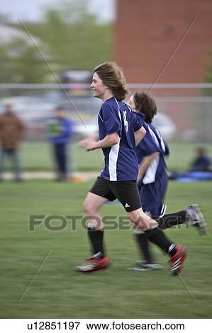 Stock Photo - playing, saskatchewan, regina, soccer, boys. Fotosearch