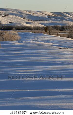 Picture - pound, drifts, buffalo, road, causeway, snow. Fotosearch