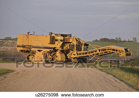 Stock Photo - repair, saskatchewan, scenic, machine, road. Fotosearch