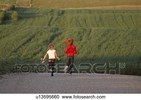 road, girls, country, down, running, two View Large Photo Image Stock Image - road, girls, country, down, running, two. Fotosearch