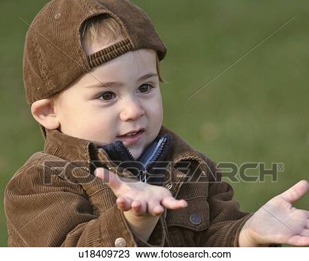 Stock Image - saskatchewan, boy, jaw, moose, posing, young. Fotosearch