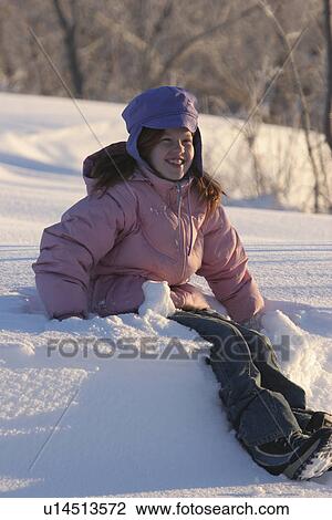 Stock Image - saskatchewan, girl, scenic, snow, playing, pretty. Fotosearch