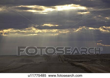 scenic, beams, clouds, through, peaking, sun View Large Photo Image Stock Photography - scenic, beams, clouds, through, peaking, sun. Fotosearch