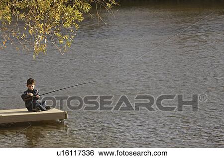 Stock Photograph - scenic, boy, dock, off, fishing, young. Fotosearch