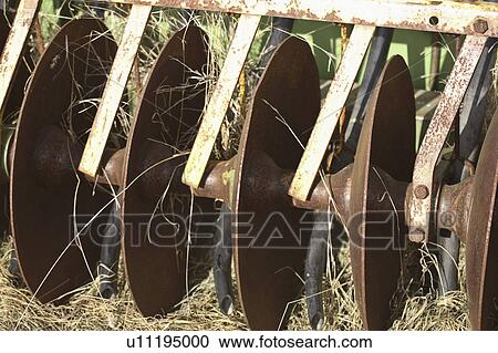 Stock Image - scenic, discs, implement, farm, abandoned, rusting. Fotosearch