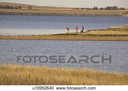 Stock Image - scenic, sons, diefenbaker, lake, fishing, father. Fotosearch